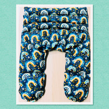 Load image into Gallery viewer, Lupin-filled hot or cold pack for body aches, pains and inflammation in teal green boho rainbow and floral cotton fabric – handmade by Blair Henry Designs