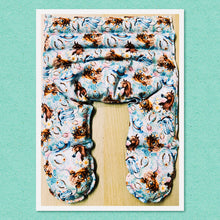 Load image into Gallery viewer, Lupin-filled hot or cold pack for body aches, pains and inflammation in light blue country horse highland cow hat and boots floral cotton fabric – handmade by Blair Henry Designs
